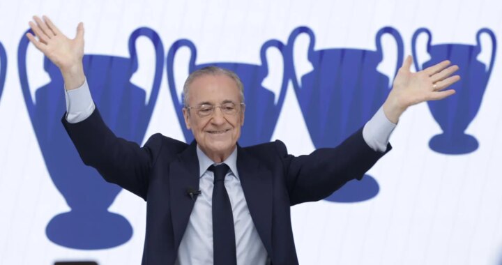 Florentino Pérez en rueda de prensa tras elecciones del Real Madrid con carteles de 'El Madrid no se vende' al fondo
